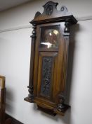 An antique mahogany clock case with a Smiths movement