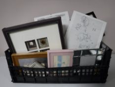 A box containing a quantity of contemporary framed prints,