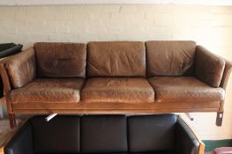 A late twentieth century Danish brown leather settee
