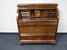 A late nineteenth century inlaid mahogany cylinder bureau