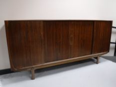 A Danish rosewood four door sideboard CONDITION REPORT: Section of top sun-faded,