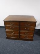 A mahogany four drawer filing chest with key