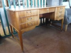 A mid twentieth century teak writing desk,