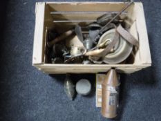 A box of assorted metal ware and copper, bellows, oil lamps, door handles,