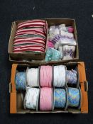 Two boxes containing fabric trim