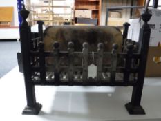 A cast iron fire grate
