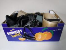 A box of cameras and equipment including Olympus OMi