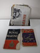 A box containing mid twentieth century military magazines,