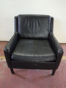 A late twentieth century Danish brown leather armchair CONDITION REPORT: 69cm wide.