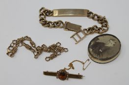 A yellow metal identity bracelet, 33.