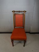 An antique mahogany hall chair
