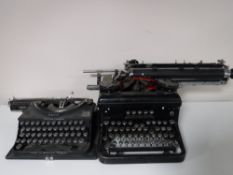 A vintage Imperial typewriter and one other