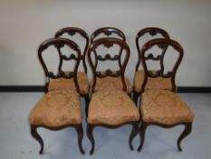 A set of six Victorian mahogany dining chairs