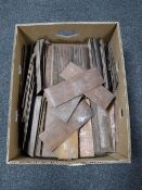 A box of parquet flooring