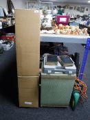 A knitting machine together with a loom box, a faux fur coat,