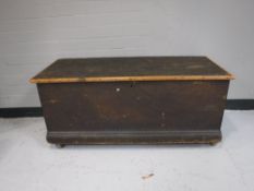 An early 20th century pine blanket box