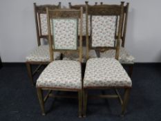A set of five Edwardian carved oak chairs