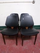 A set of four teak G plan dining chairs