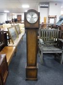 An oak granddaughter clock