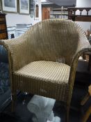 A gold loom basket chair