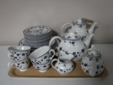 Two trays containing sixty seven pieces of Royal Doulton York Town tea and dinnerware,