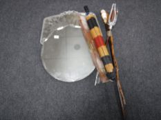 Two un-framed mirrors, bundle of walking sticks, shooting stick,