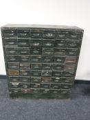 An industrial metal 54 drawer chest