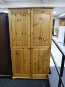 A pine double door wardrobe