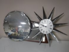 An un-framed mirror, mirror mounted on a teak board,