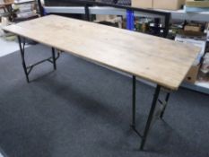 Two mid twentieth century folding trestle tables
