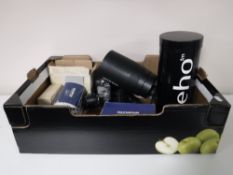 A Zenit E camera with lens,