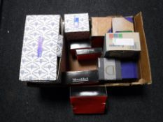 A box of boxed Dartington Crystal vases, Villeroy & Boch glass ware,
