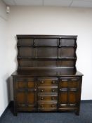 An Ercol dark oak dresser