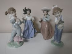Four Nao figures of girls, including girl with flowers,