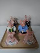 A tray containing a set of six Wade Natwest pigs