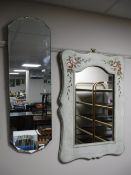 A floral painted framed mirror and an un-framed hall mirror
