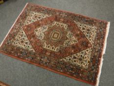 A Tabriz design rug,
