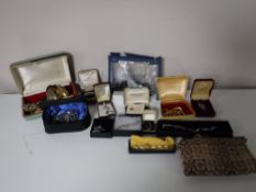 A box containing a collection of sterling silver and costume jewellery,