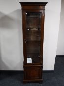 A reproduction mahogany display cabinet retailed by Collard & Collard