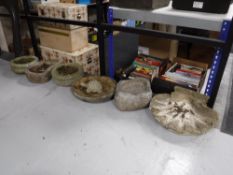 Four stone garden planters,