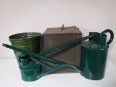 Two enamelled buckets together with two vintage watering cans and two graduated tin boxes