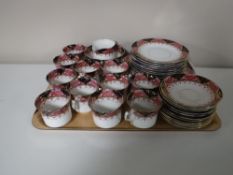A tray containing thirty-five pieces of antique Diamond tea china
