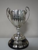 A sterling silver twin handled trophy, 'Pearl Life Assurance Co Challenge Cup', 441g,