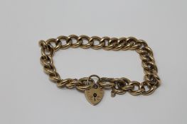 A 9ct gold padlock bracelet, 41.2g.