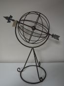 A spherical weather vane