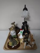 A tray of Tiffany style table lamp, three Border Fine Arts figures on wooden stands,