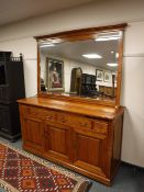 A Barker and Stonehouse contemporary dresser with mirrored back,