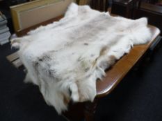 A reindeer skin rug