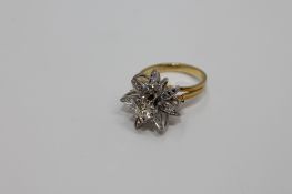 An 18ct gold diamond set ring, the principal stone weighing an estimated 0.3 carat, 7.