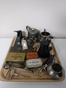 A tray of plated tea service, trophy, stirrup cup in leather case, vintage tins, bottle opener,